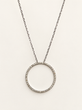 Closer view of the 21 mm open-circle pendant with natural diamonds