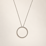 14K white gold open-circle natural diamond necklace, 21 mm pendant, on a clean ivory background