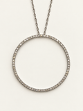Closer detail of the 33 mm 14K white gold open-circle pendant accented with natural diamonds