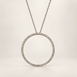 14K white gold natural diamond open-circle necklace with a 33 mm pendant on an ivory studio background