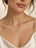 Model wearing a 14K white gold natural diamond circle necklace