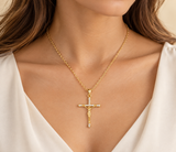 Model wearing Freya gold-plated CZ crucifix necklace