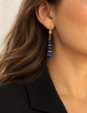 Close-up of the Bliss natural Lapis Lazuli drop earrings worn by a model