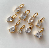 Assorted gold-tone cubic zirconia pendant models