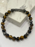 chisel - skulls and tiger eye bracelet