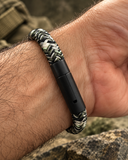 Close-up of Ebedi camouflage woven acrylic cord bracelet black IP stainless steel clasp