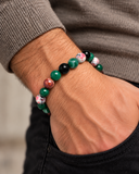 Custom-made ebedi green agate, fire onyx and black onyx bracelet worn on a man's wrist