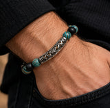 ebedi custom beaded bracelet worn on a man's wrist