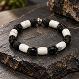 Ebedi white marble, black onyx skull and lava stone stretch bracelet