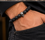 Ebedi lava bead skull bracelet worn on wrist