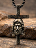 Moda custom made Jesus face stainless steel cross pendant front view on stone