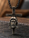Moda custom made cross pendant front view on dark slate