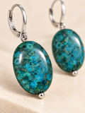 Close-up of blue jasper stone and stainless steel earring details