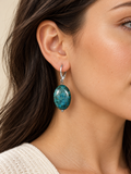 Blue jasper earrings worn at realistic proportional scale