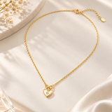 freya gold-plated sterling silver heart CZ necklace, styled standalone photograph