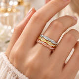 Model wearing three-colour Freya stackable rings together