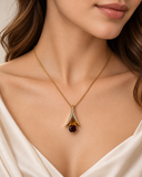 Model wearing the Galatea citrine garnet and diamond necklace