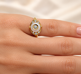 Galatea pearl-centred diamond ring worn face-on on a feminine hand