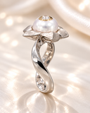 Galatea ring side view showing wave-shaped white gold shank