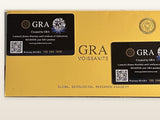 GRA moissanite certificate folder and warranty cards on a clean ivory background