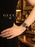 GUCCI vintage watch in styled wrist lifestyle photograph