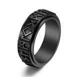 Black stainless steel Viking rune spinner ring, white background