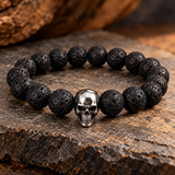 Close-up of Ebedi lava beads and stainless steel skull bead
