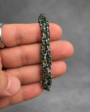 Close-up of triple-braided camouflage cord bracelet