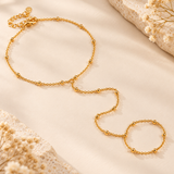Gold-plated sterling silver beaded slave hand bracelet, styled standalone product photo