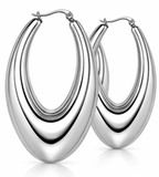 Close-up of silver stainless steel nested hoop earrings