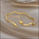 Yana snake bangle in stainless steel with gold PVD plating