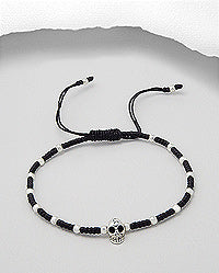 Skull and beads sterling silver Bracelet with woven Polyester