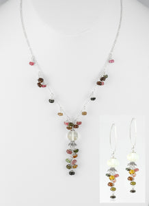 Handcrafted set hang from flowering 925 sterling silver.